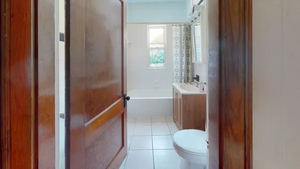a bathroom with a toilet and a sink