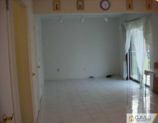 3 Churchill Road Edison, NJ 08820 - Photo 5 of 8 a view of an empty room