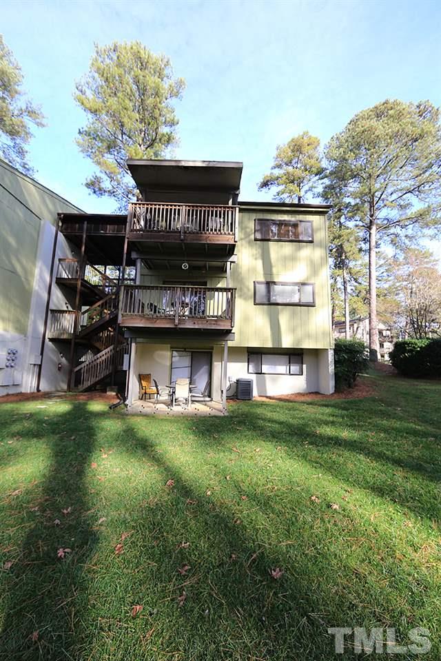 524 Pine Ridge Place, Unit 524 Raleigh, NC 27609 - Photo 12 of 12 a view of a water fountain in front of a house