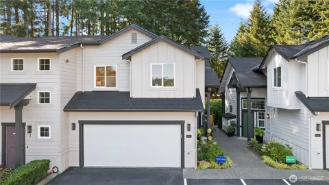 a front view of a house with yard