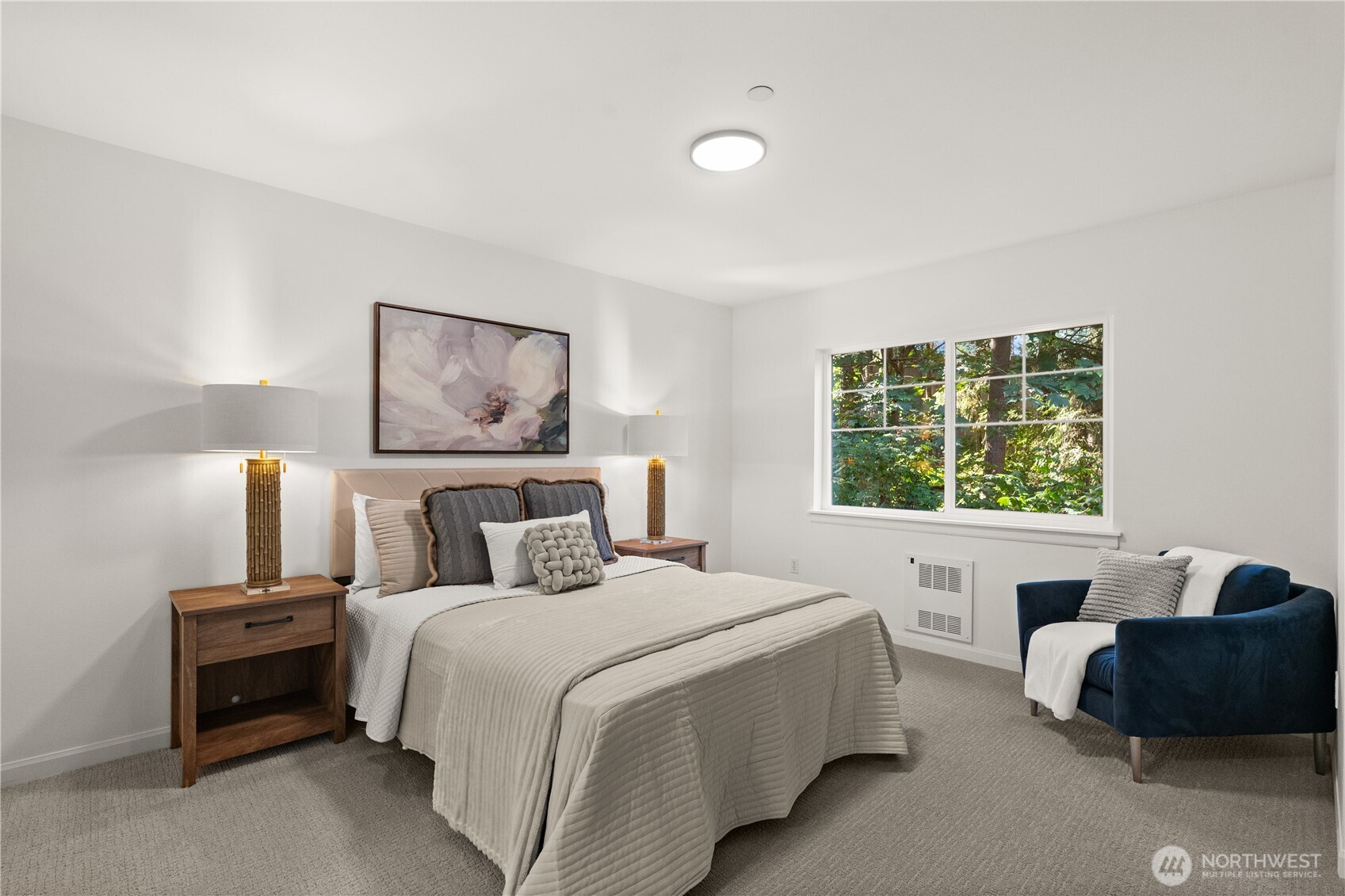 23210 Fitzgerald Road, Unit 2 Bothell, WA 98021 - Photo 12 of 26 a bedroom with a bed and a couch