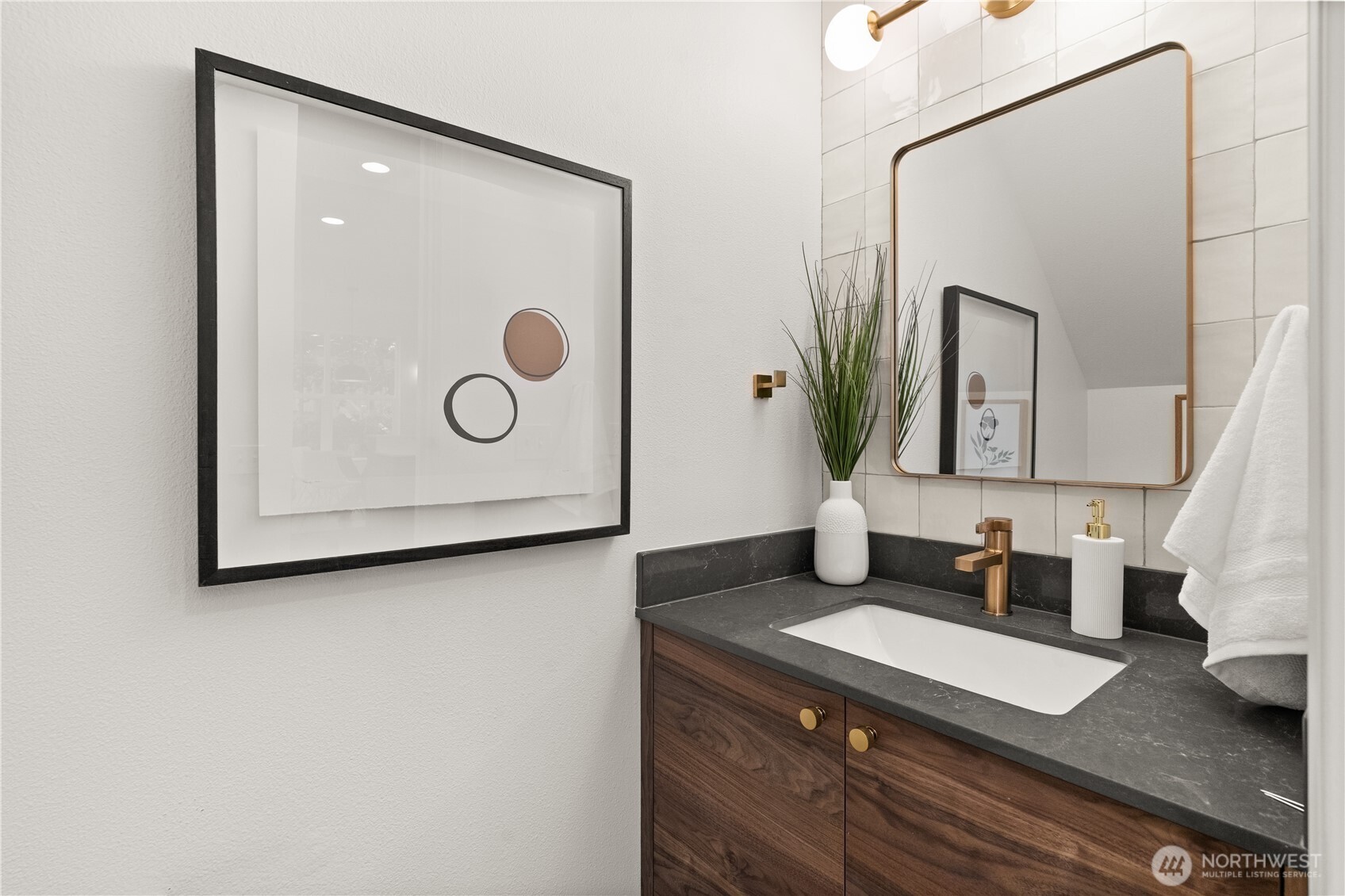 23210 Fitzgerald Road, Unit 2 Bothell, WA 98021 - Photo 20 of 26 a bathroom with a sink and a mirror