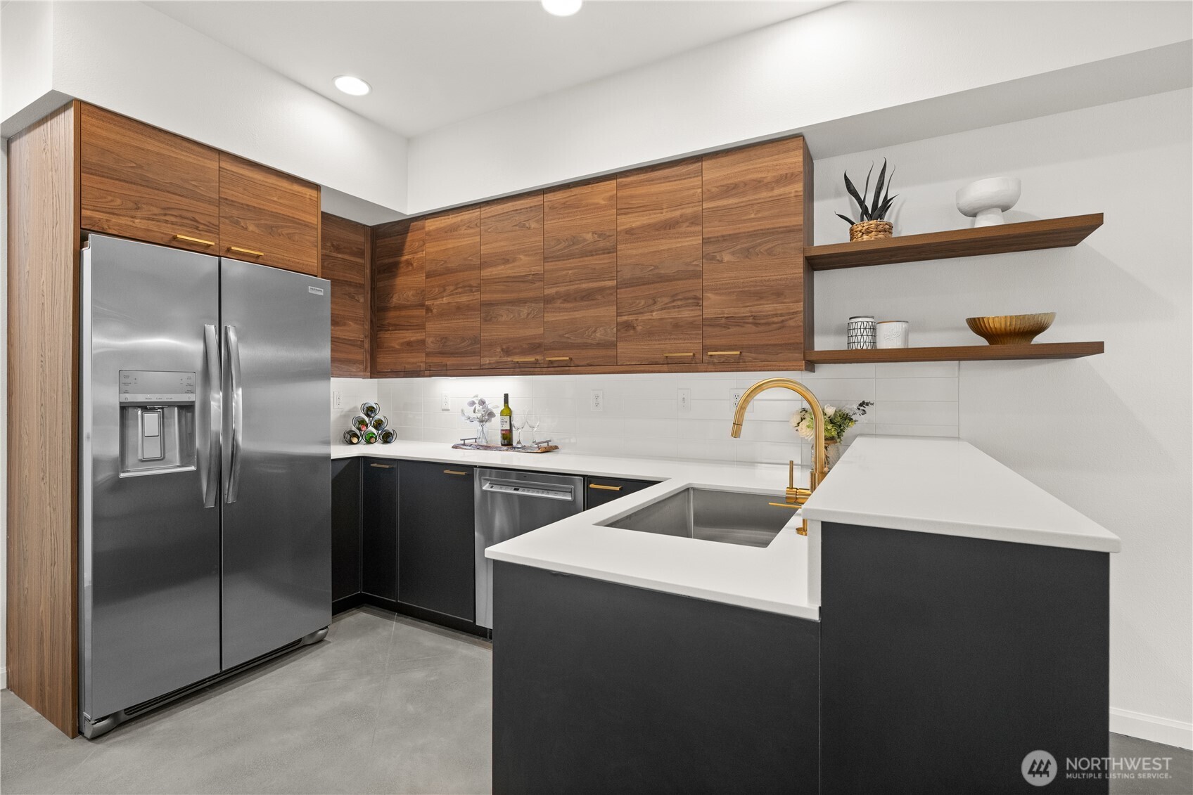 23210 Fitzgerald Road, Unit 2 Bothell, WA 98021 - Photo 4 of 26 a kitchen that has a sink stainless steel appliances and cabinets