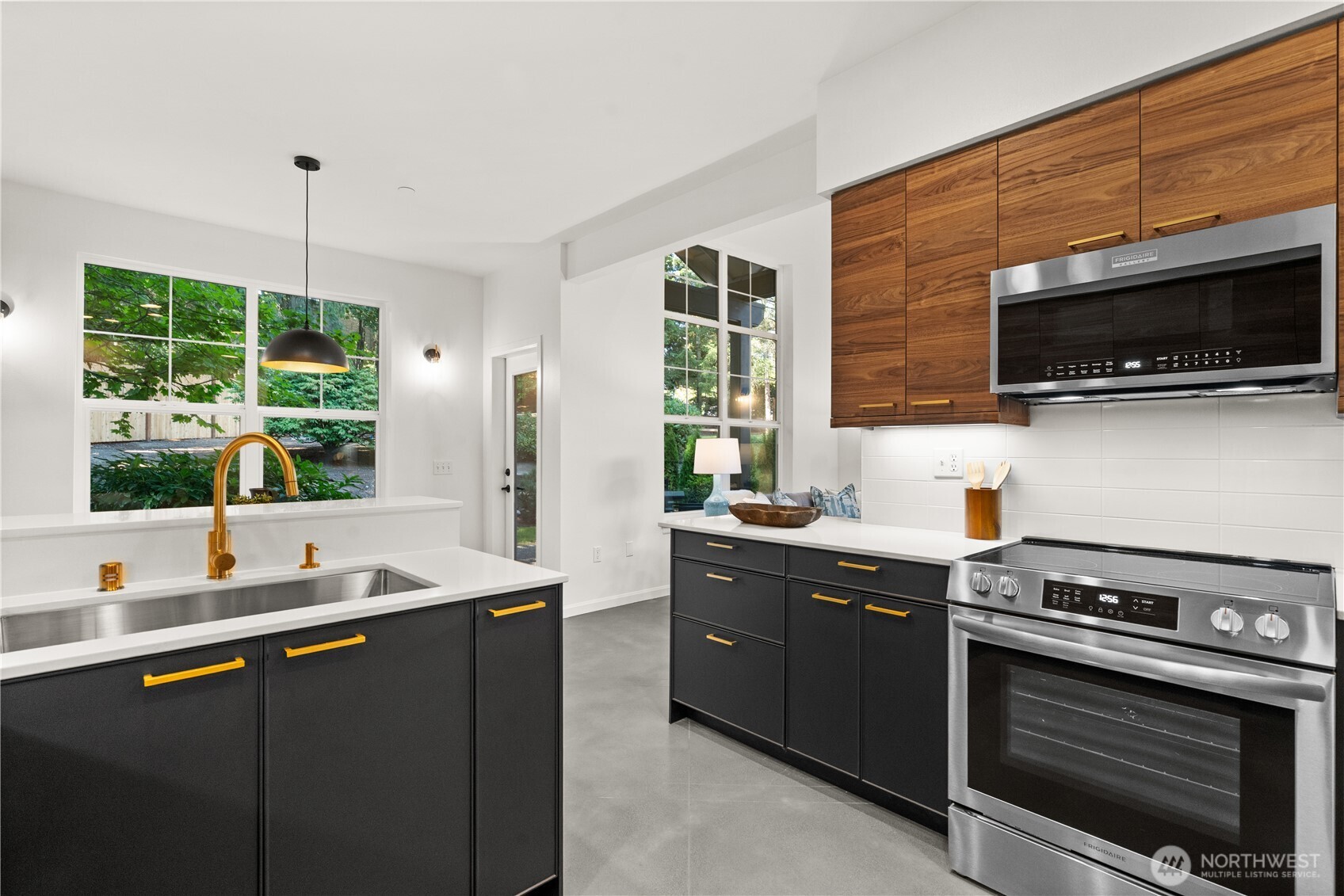 23210 Fitzgerald Road, Unit 2 Bothell, WA 98021 - Photo 6 of 26 a kitchen with a sink stove and microwave