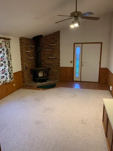 a view of a livingroom with furniture