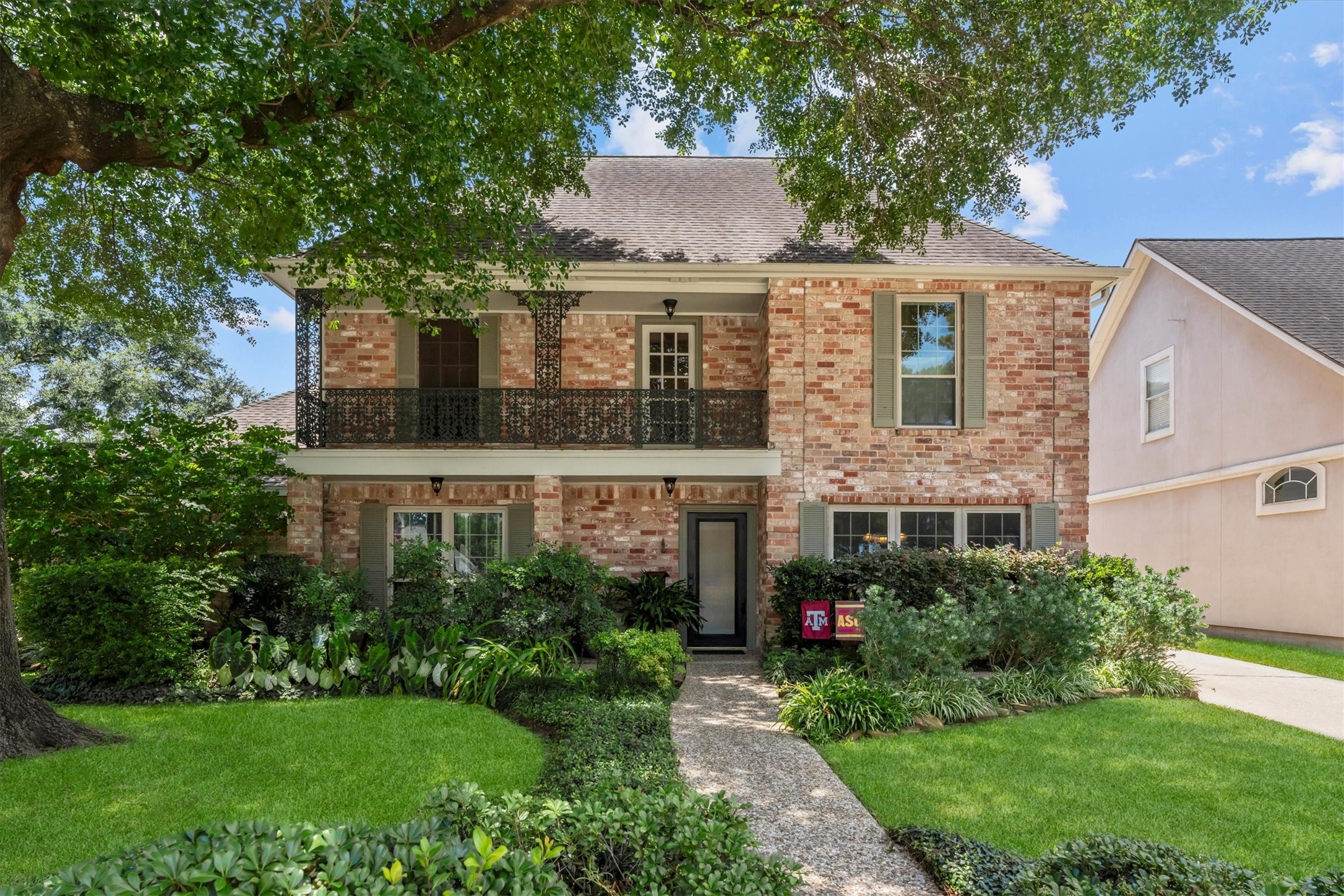 9103 Herts Road Spring, TX 77379 - Photo 1 of 46 Welcome to this stately Southern colonial home, complete with a timeless wrought iron balcony, located in the heart of Champion Forest.