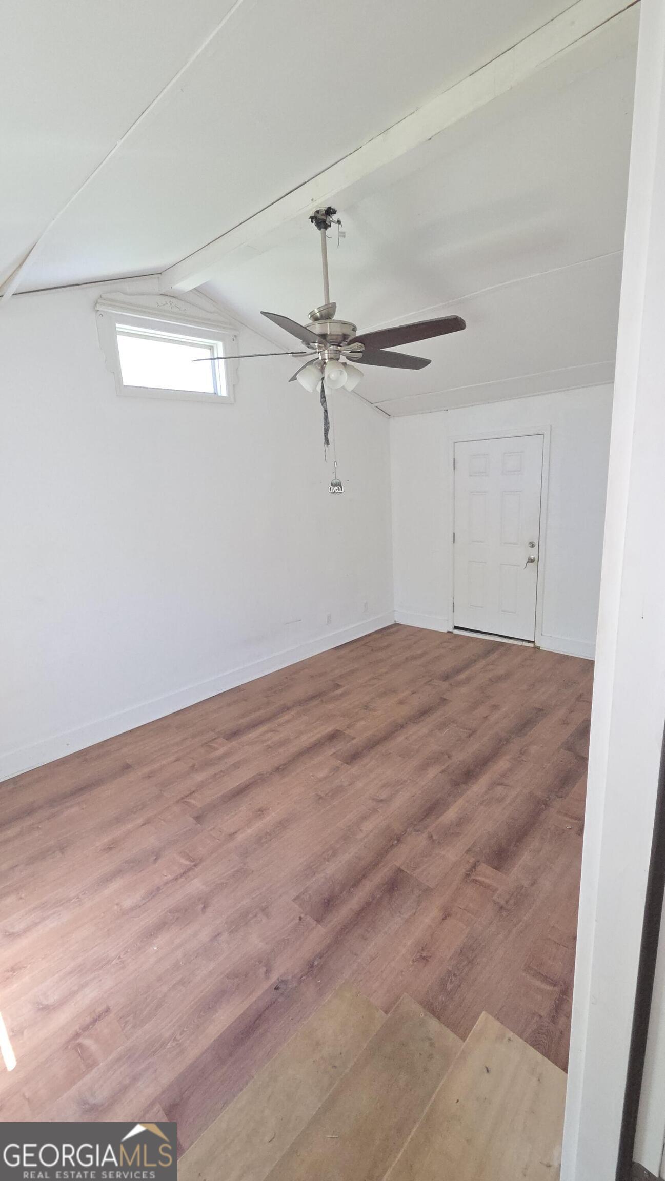 25 Fischer Road Sharpsburg, GA 30277 - Photo 17 of 22 a view of a room with wooden floor