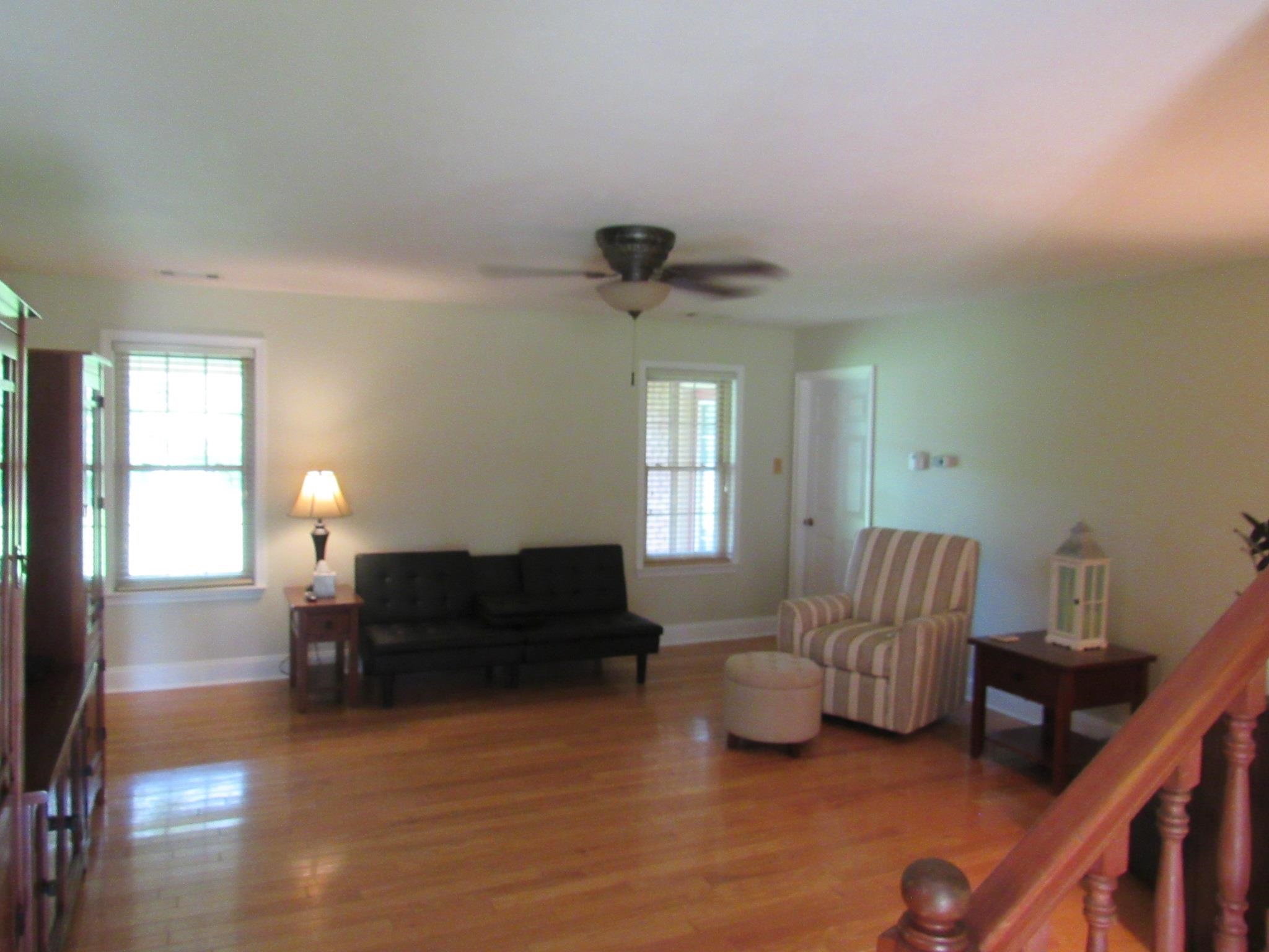 498 McQuiston Road Brighton, TN 38011 - Photo 4 of 17 a living room with furniture and a window