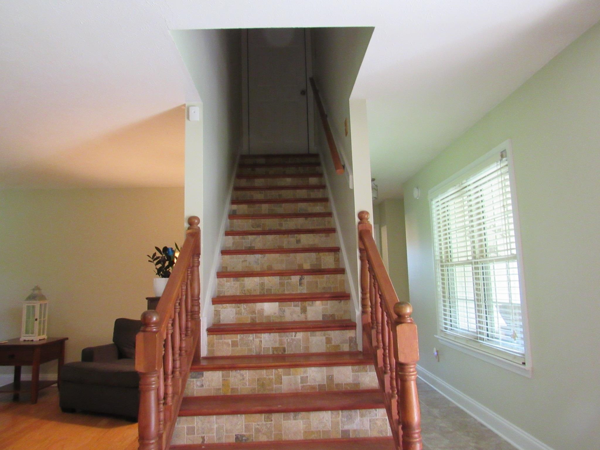 498 McQuiston Road Brighton, TN 38011 - Photo 5 of 17 a view of entryway and hall with wooden floor