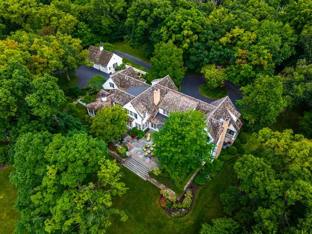 a room with furniture and pool table