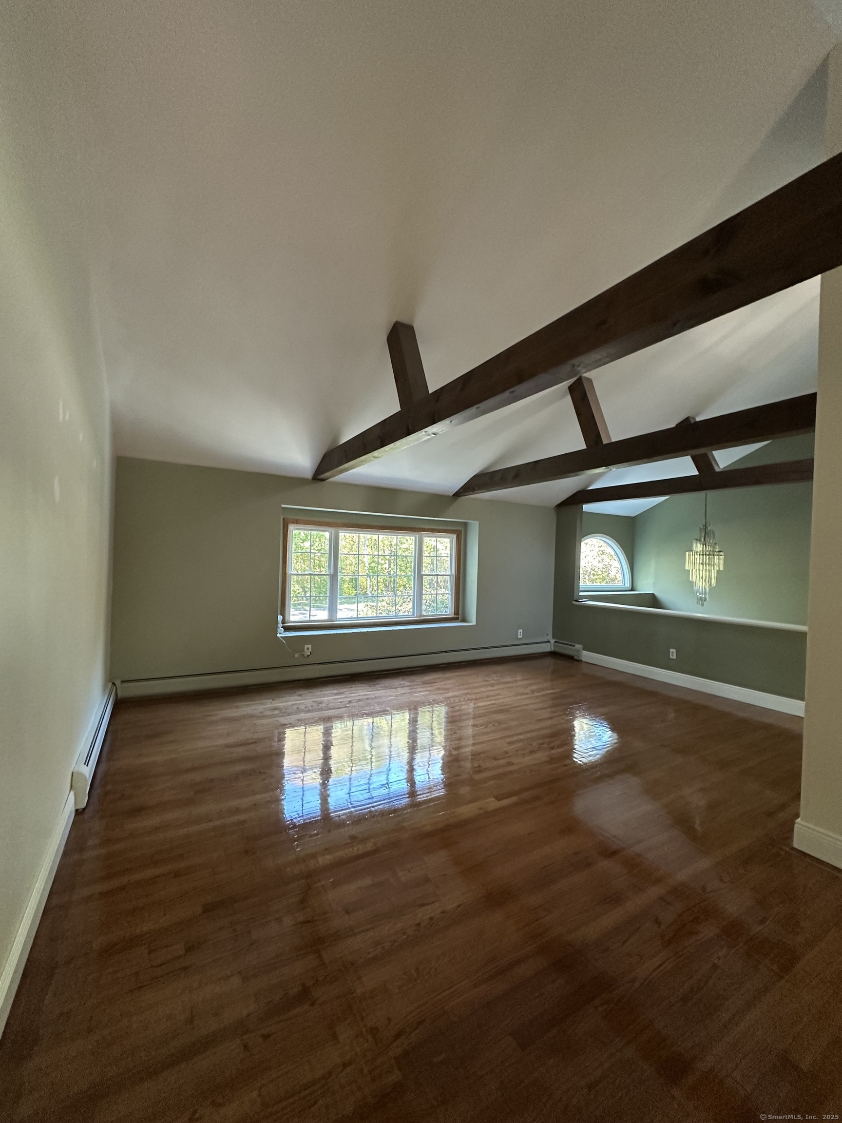 80 Woodlawn Road Monroe, CT 06468 - Photo 13 of 40 a view of an empty room with window and stairs