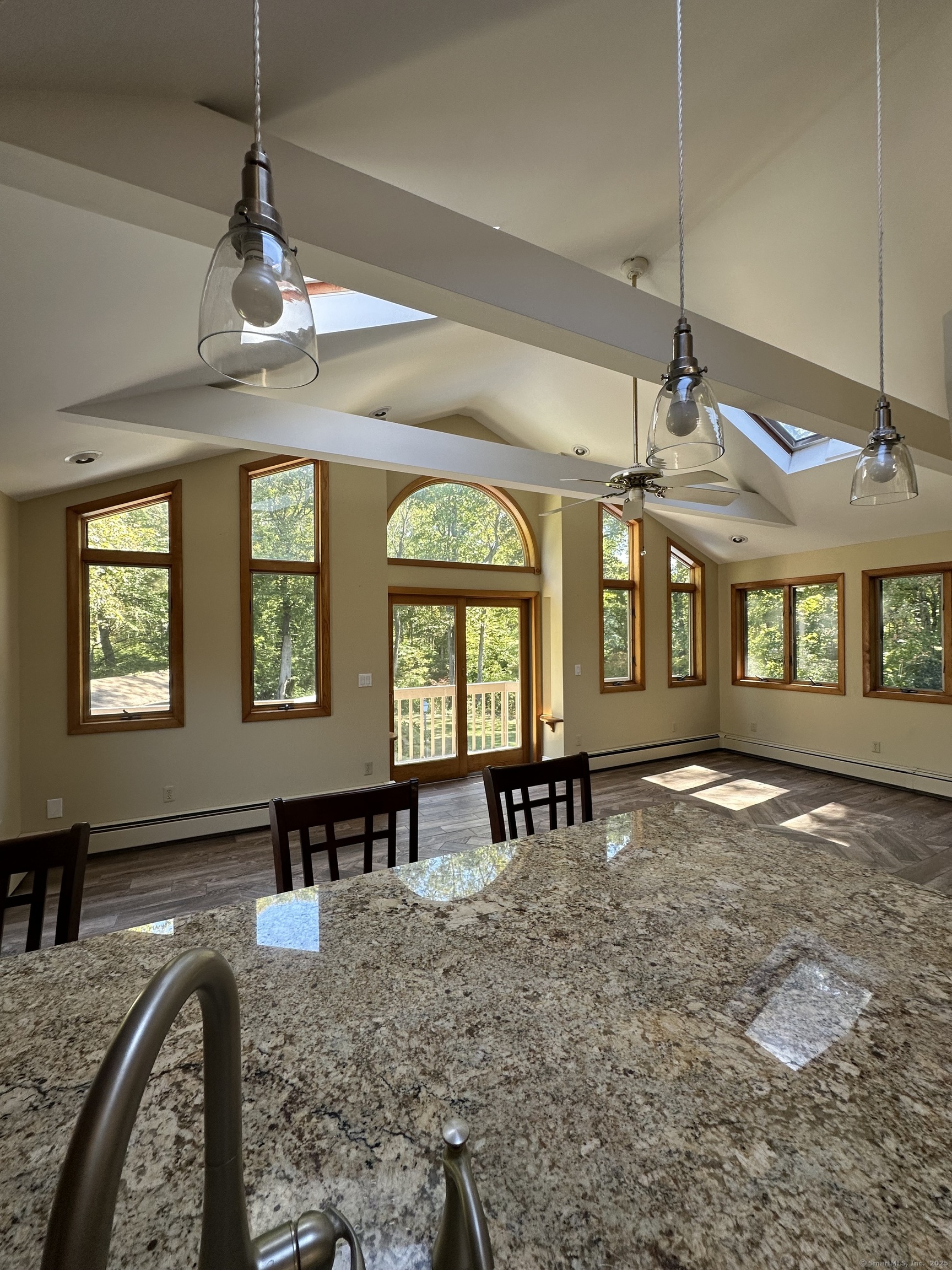 80 Woodlawn Road Monroe, CT 06468 - Photo 19 of 40 a view of a livingroom with furniture window and wooden floor