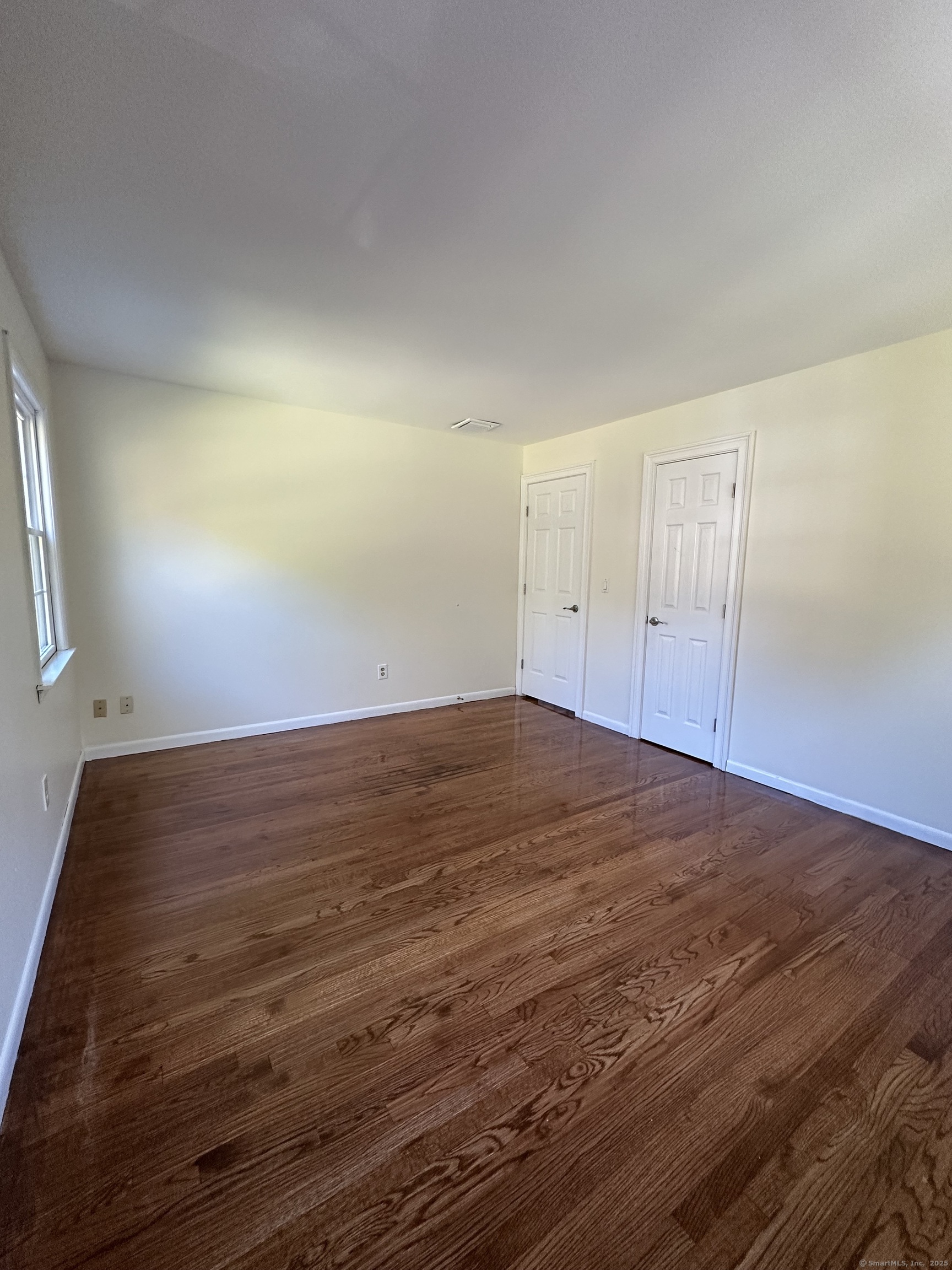 80 Woodlawn Road Monroe, CT 06468 - Photo 31 of 40 a view of empty room with wooden floor