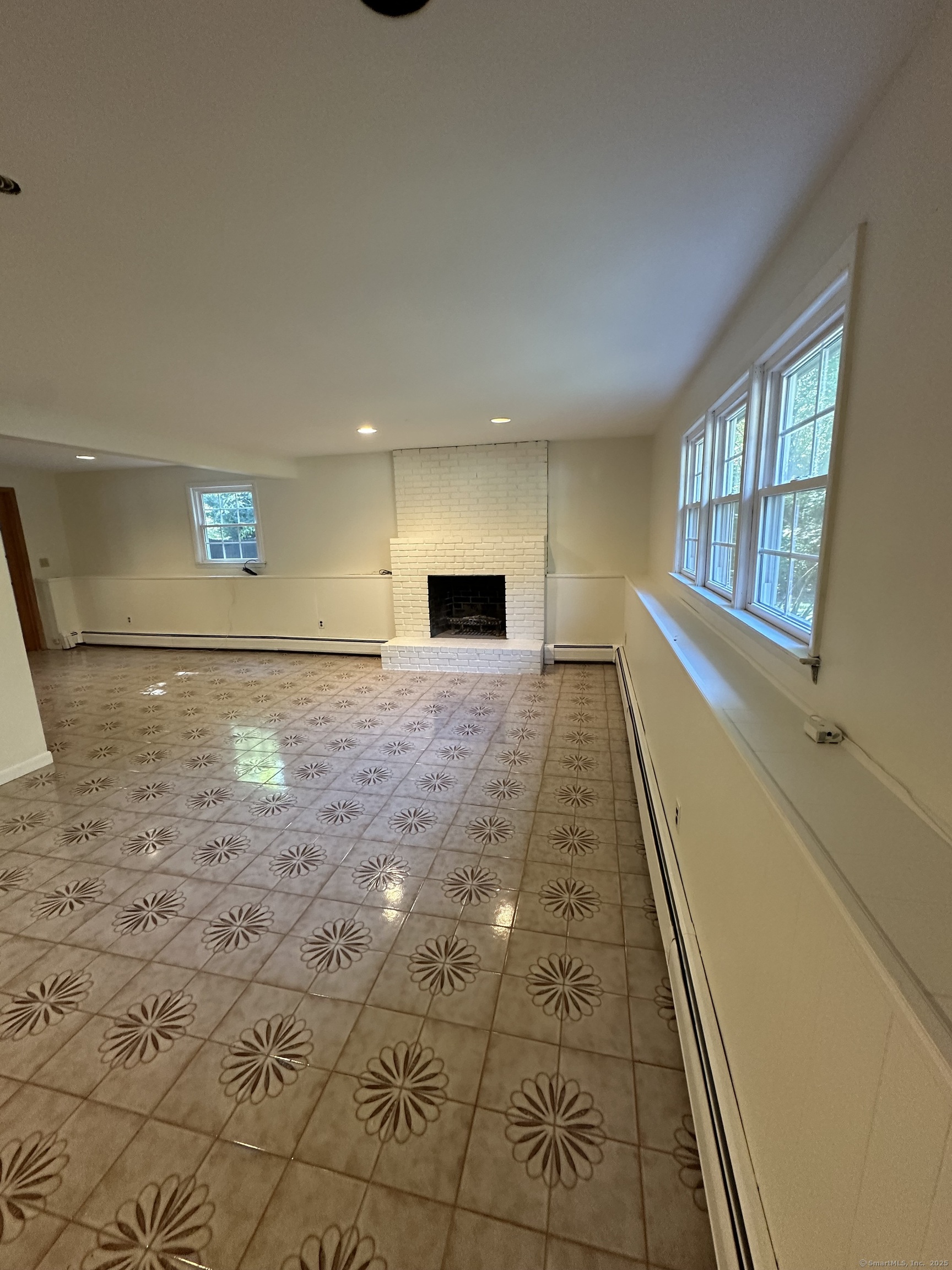 80 Woodlawn Road Monroe, CT 06468 - Photo 34 of 40 a view of a hallway with an empty room