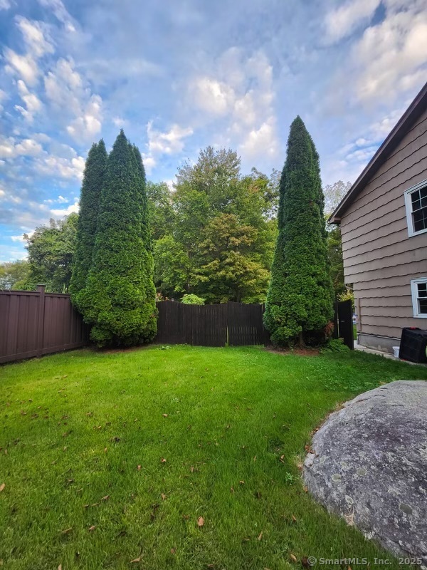80 Woodlawn Road Monroe, CT 06468 - Photo 6 of 40 a view of a back yard