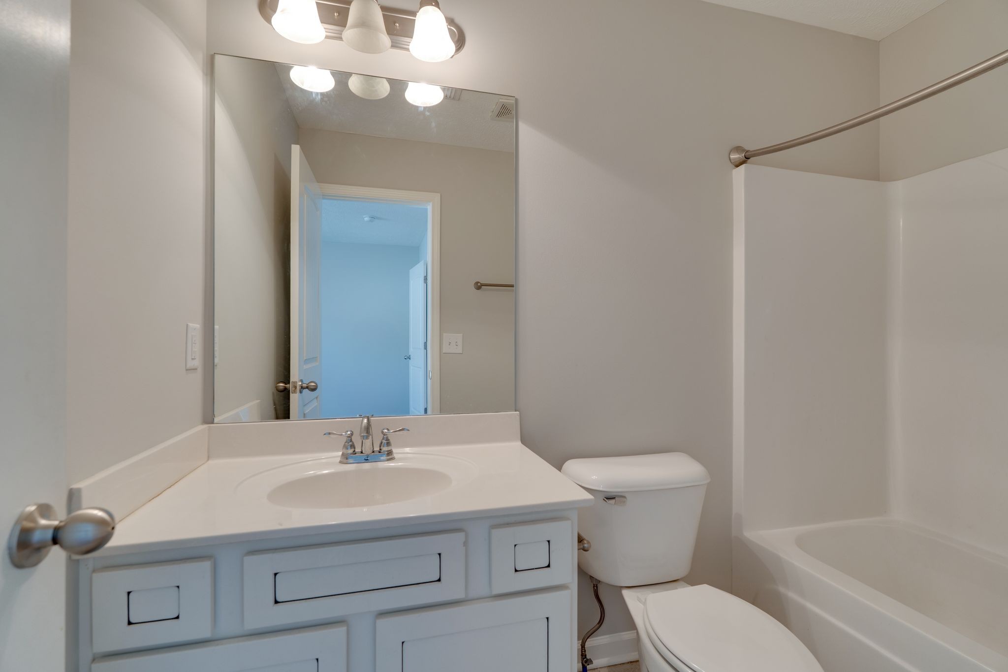 810 Staten Drive Murfreesboro, TN 37128 - Photo 18 of 20 a bathroom with a sink a toilet and shower
