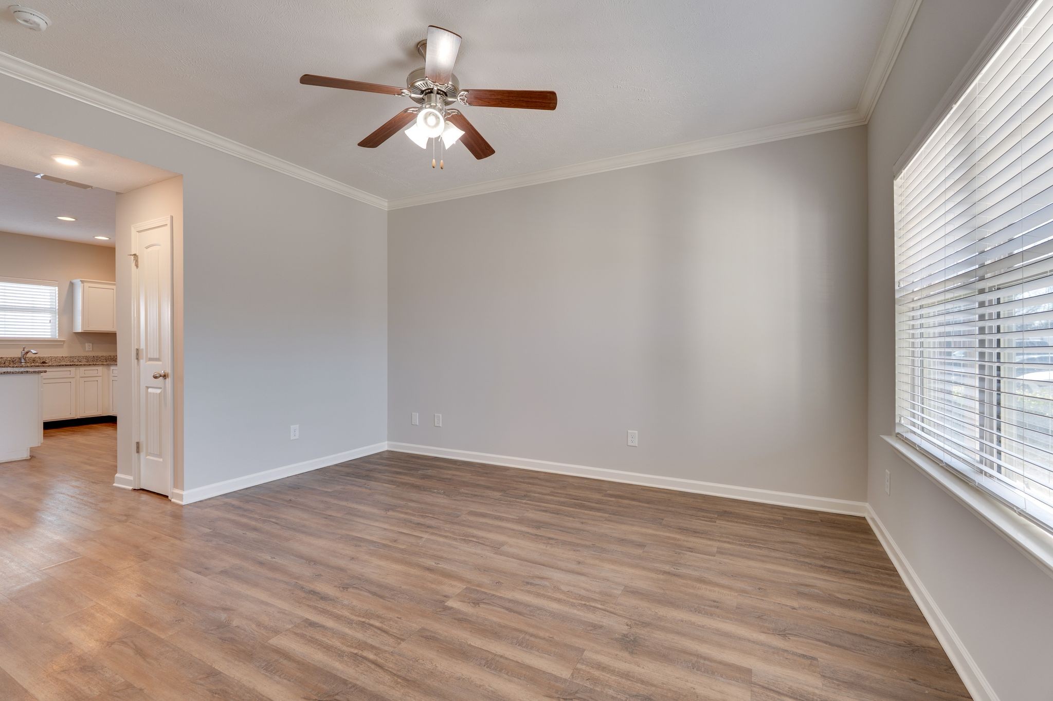 810 Staten Drive Murfreesboro, TN 37128 - Photo 4 of 20 wooden floor in an empty room with a window