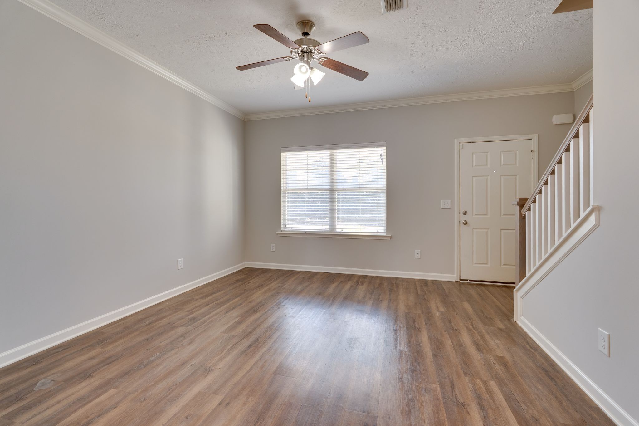 810 Staten Drive Murfreesboro, TN 37128 - Photo 5 of 20 wooden floor in an empty room with a window