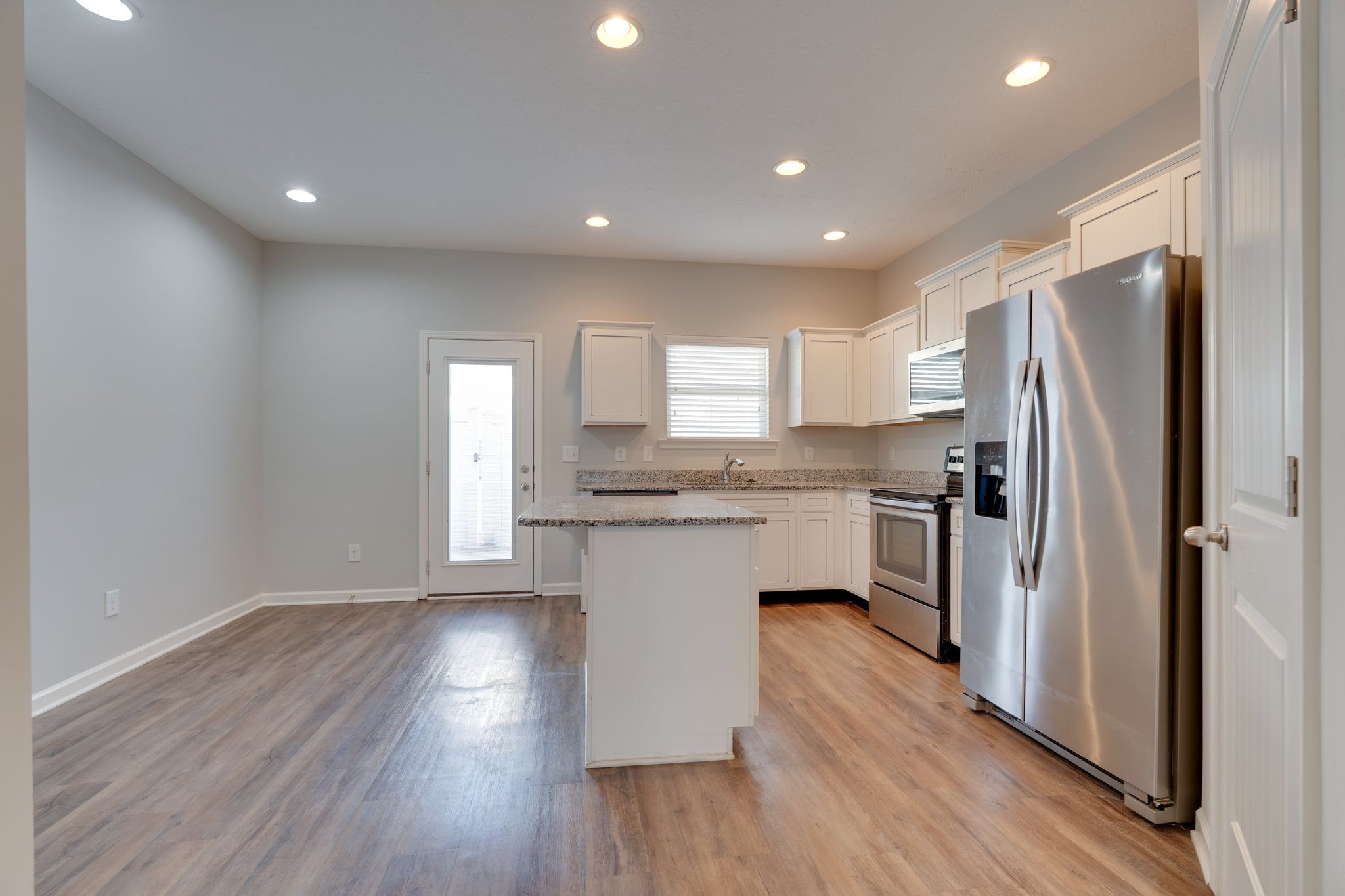 810 Staten Drive Murfreesboro, TN 37128 - Photo 7 of 20 a kitchen with a refrigerator a sink and cabinets