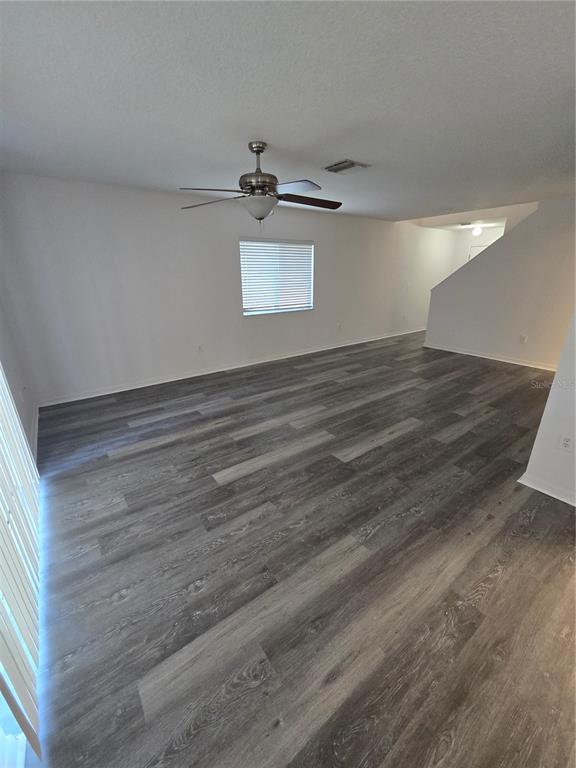 13126 Fennway Ridge Drive Riverview, FL 33579 - Photo 2 of 10 a view of a room with wooden floor