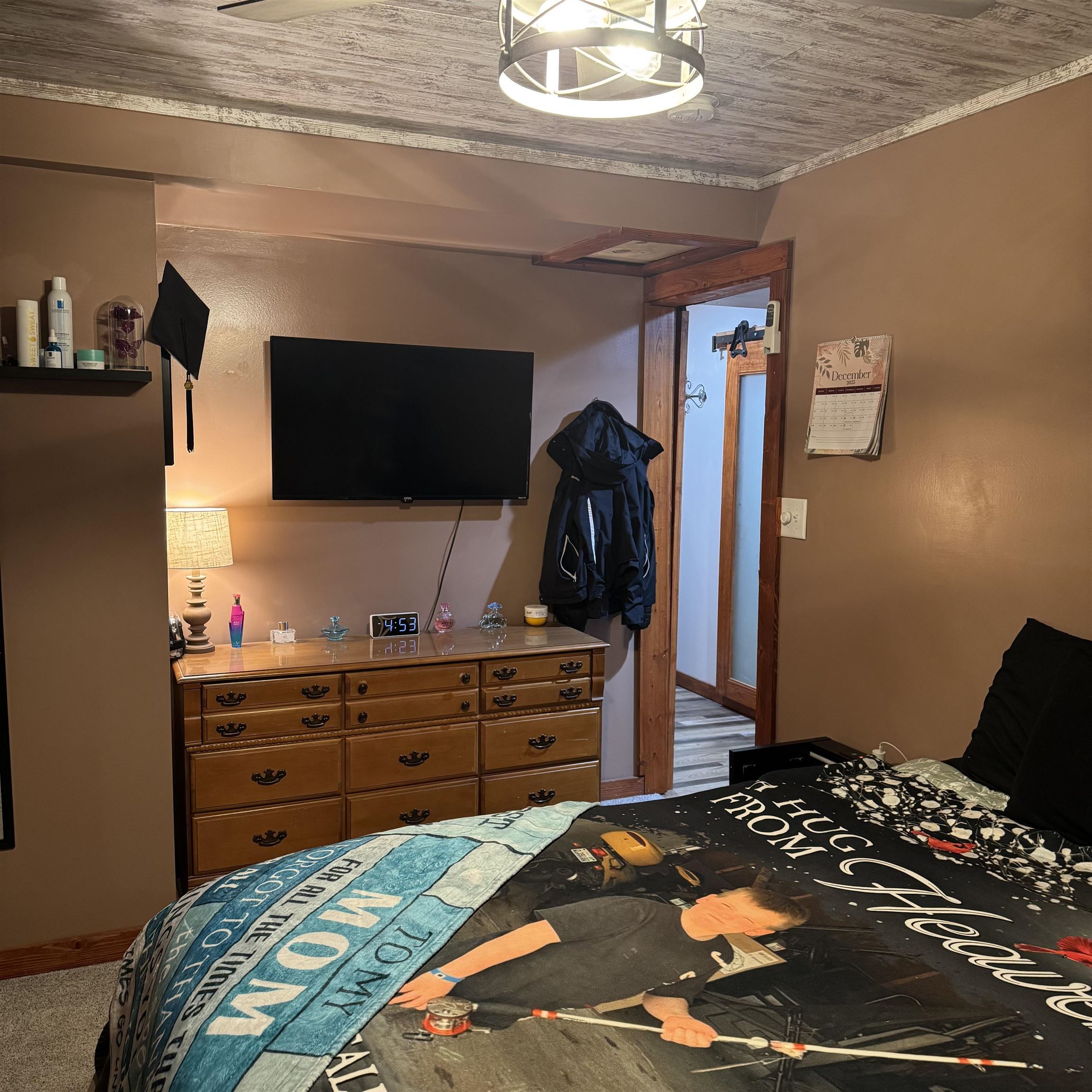 342 West Front Avenue Stockton, IL 61085 - Photo 10 of 21 a bedroom with a bed and a flat screen tv