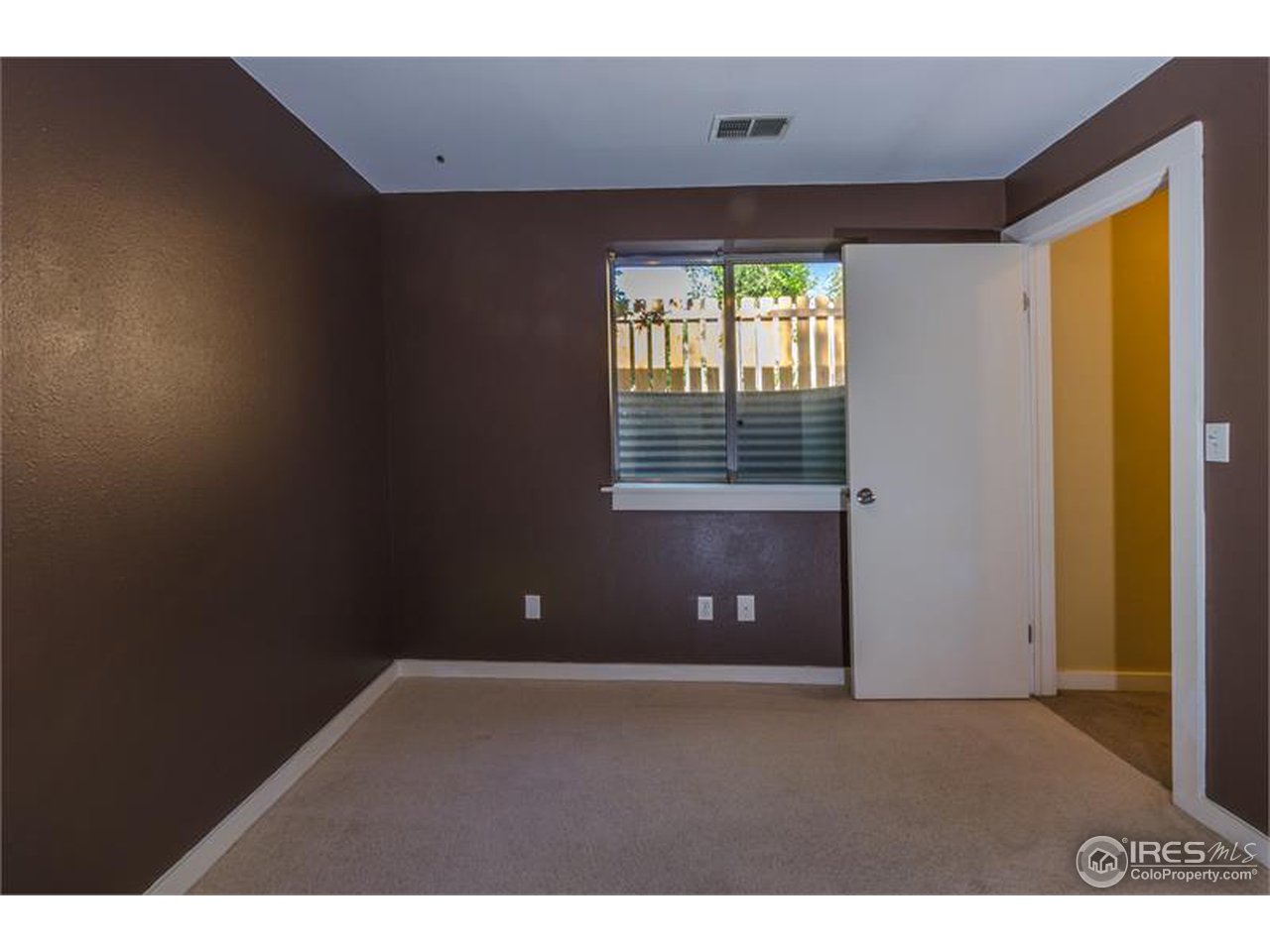 711 East Baseline Road Lafayette, CO 80026 - Photo 17 of 21 a view of an empty room with a window
