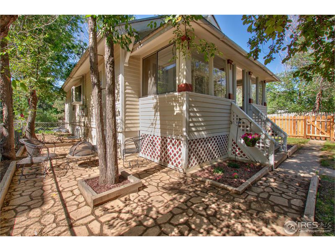 711 East Baseline Road Lafayette, CO 80026 - Photo 20 of 21 a view of a house with a yard