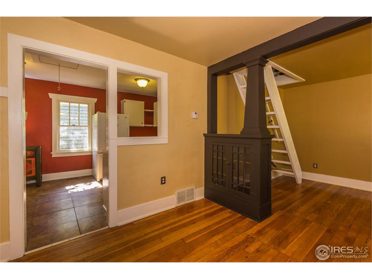 711 East Baseline Road Lafayette, CO 80026 - Photo 6 of 21 a view of an entryway with wooden floor and door
