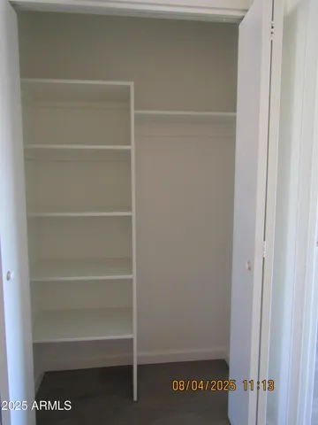 a view of a room with rack on the wall