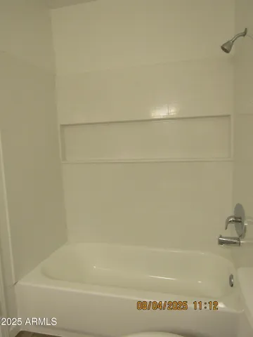 a bathroom with a bathtub