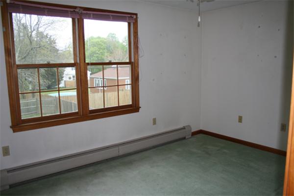 91 Spring Street Fairhaven, MA 02719 - Photo 22 of 30 an empty room with a window