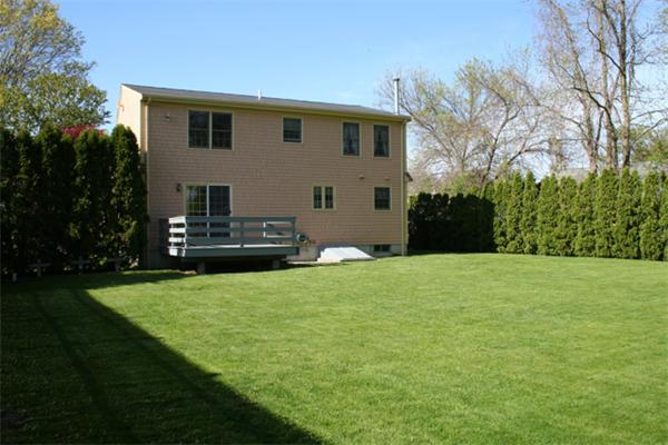 91 Spring Street Fairhaven, MA 02719 - Photo 5 of 30 a front view of house with yard