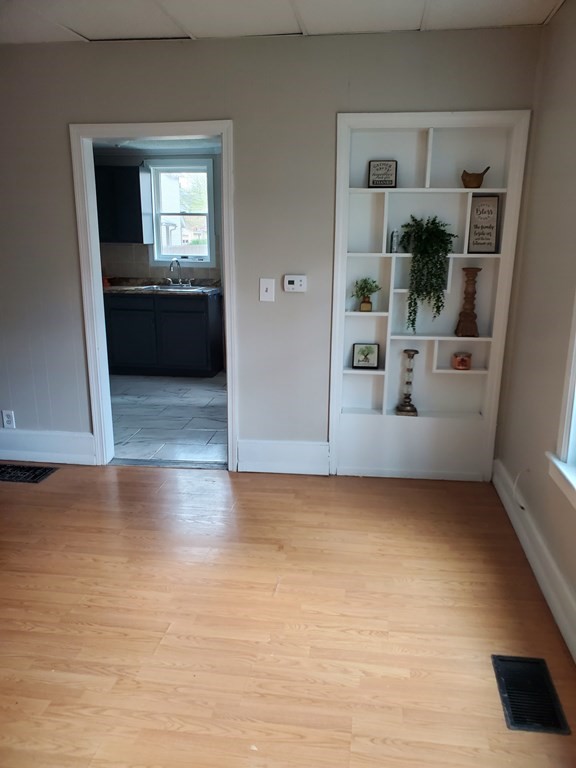 80-84 Keith Street Springfield, MA 01108 - Photo 4 of 4 an empty room with windows