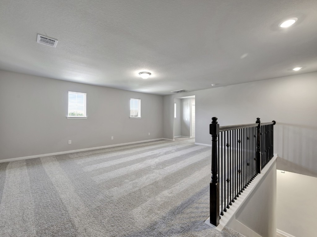 1669 Hopson Ranch Drive Conroe, TX 77301 - Photo 15 of 23 Photo is not of the actual home, but is an inspirational photo of builder’s model home and may depict options, furnishings, and/or decorator features that are not included