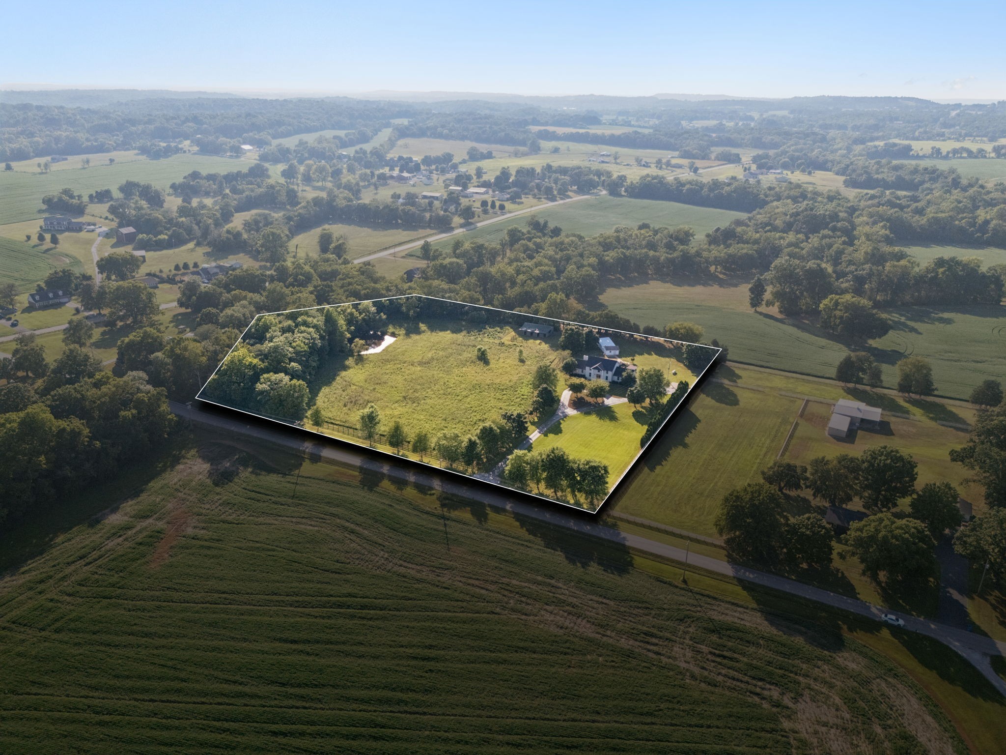 3935 Harmony Grove Road Hopkinsville, KY 42240 - Photo 60 of 64 an aerial view of lake residential house with outdoor space
