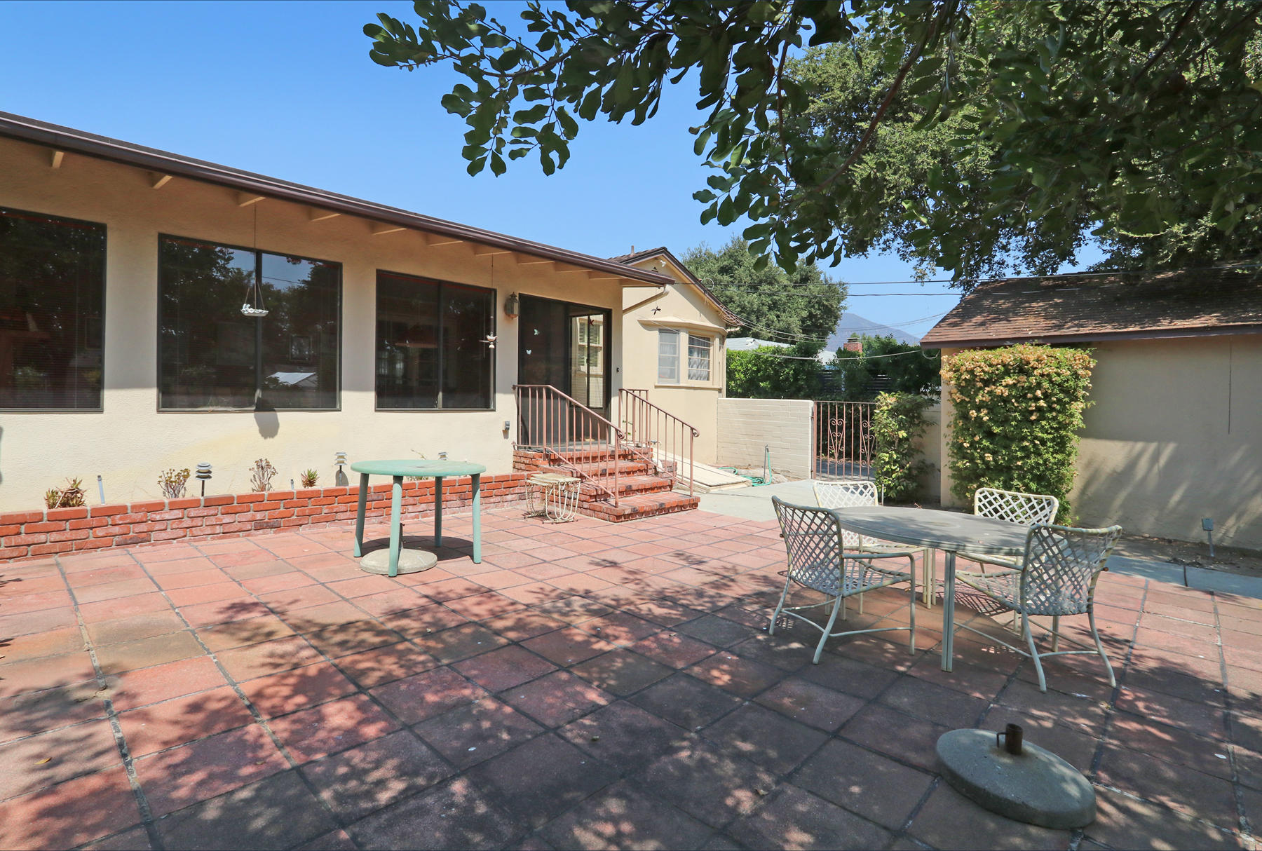 2274 Galbreth Road Pasadena, CA 91104 - Photo 22 of 24 a view of a house with backyard and sitting area