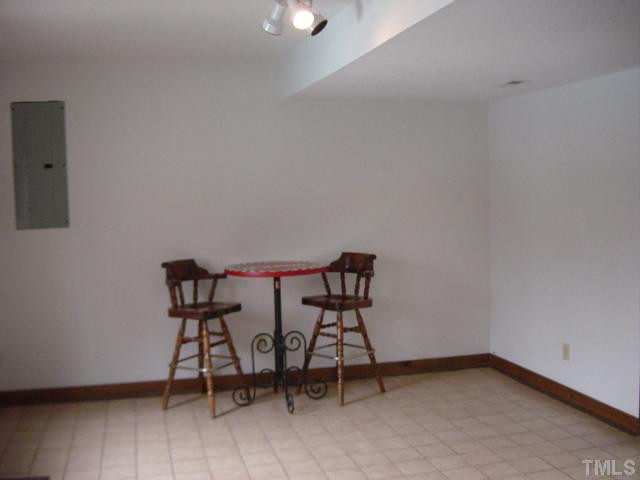 9512 Springdale Drive Raleigh, NC 27613 - Photo 6 of 11 Rec room.