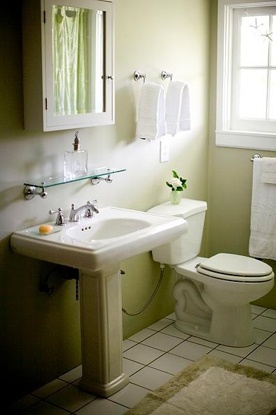 435 Hoolawa Road Haiku, HI 96708 - Photo 10 of 30 a bathroom with a sink toilet and a mirror