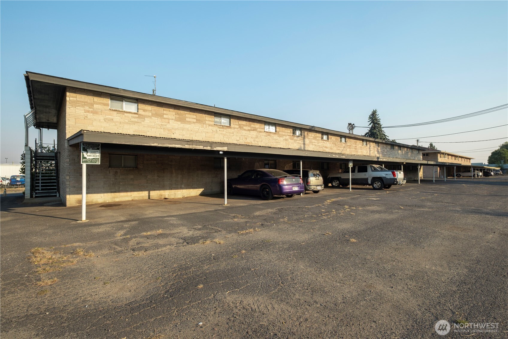 6615 North Atlantic Street Spokane, WA 99208 - Photo 21 of 22 a view of a big room with an entrance and a fireplace
