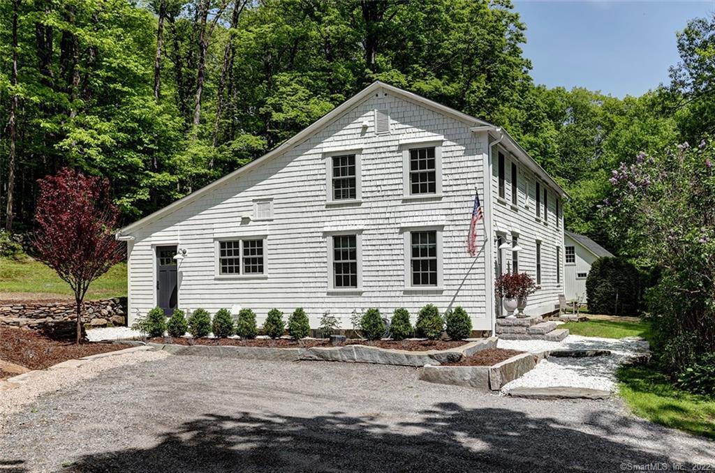 374 Sandy Brook Road Colebrook, CT 06021 - Photo 1 of 1 a front view of a house with a yard