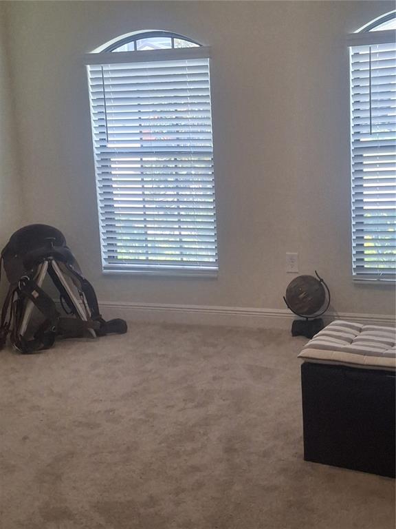 12618 Vander Way New Port Richey, FL 34654 - Photo 14 of 22 a view of a workspace with a window