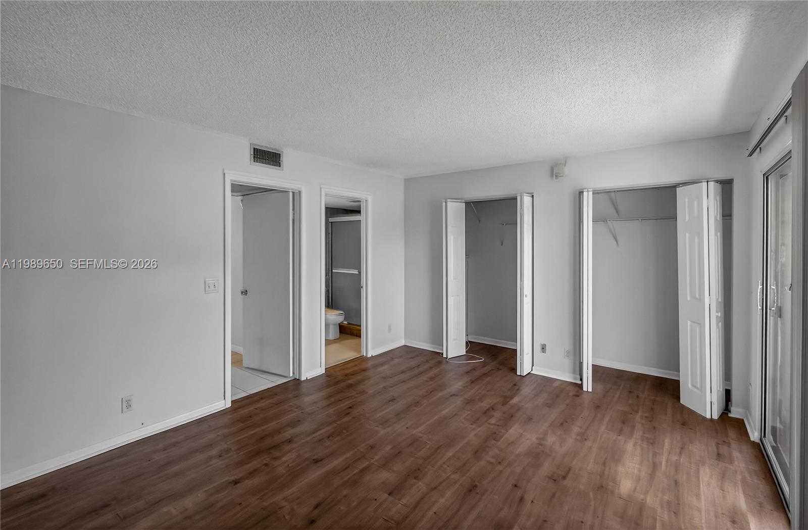 400 Southwest 134th Way, Unit 112F Pembroke Pines, FL 33027 - Photo 15 of 40 a view of hallway with wooden floor