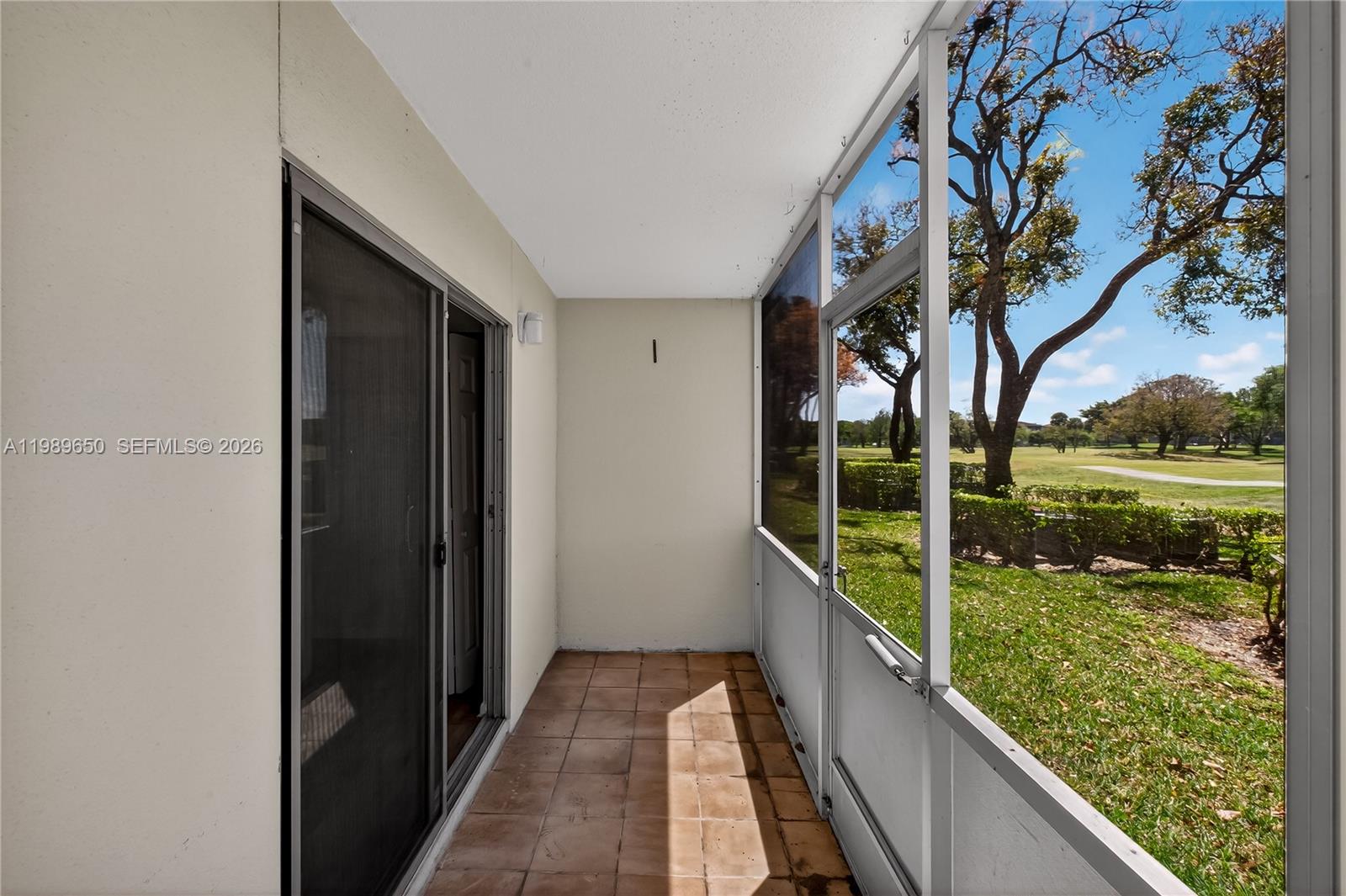 400 Southwest 134th Way, Unit 112F Pembroke Pines, FL 33027 - Photo 20 of 40 a view of balcony and yard