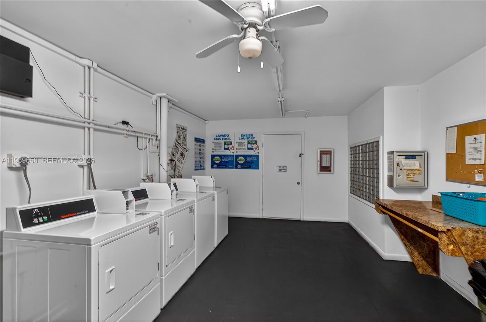 400 Southwest 134th Way, Unit 112F Pembroke Pines, FL 33027 - Photo 21 of 40 a kitchen with cabinets a sink and appliances