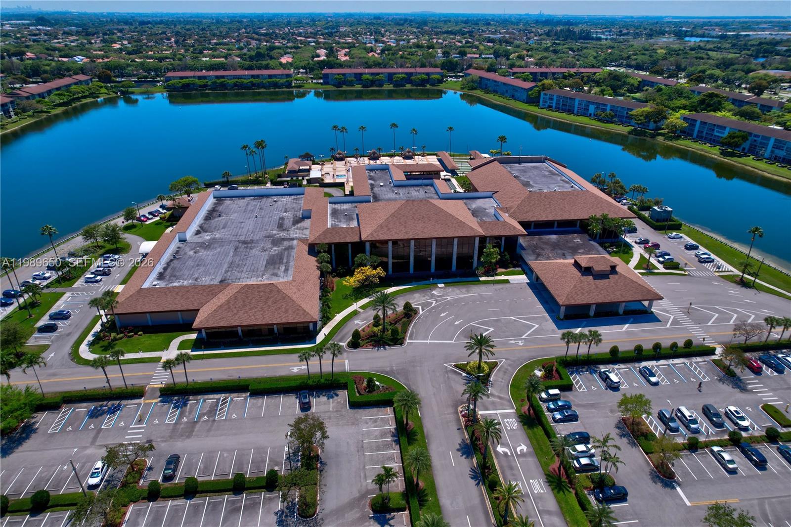 400 Southwest 134th Way, Unit 112F Pembroke Pines, FL 33027 - Photo 27 of 40 an aerial view of a house with a garden and lake view