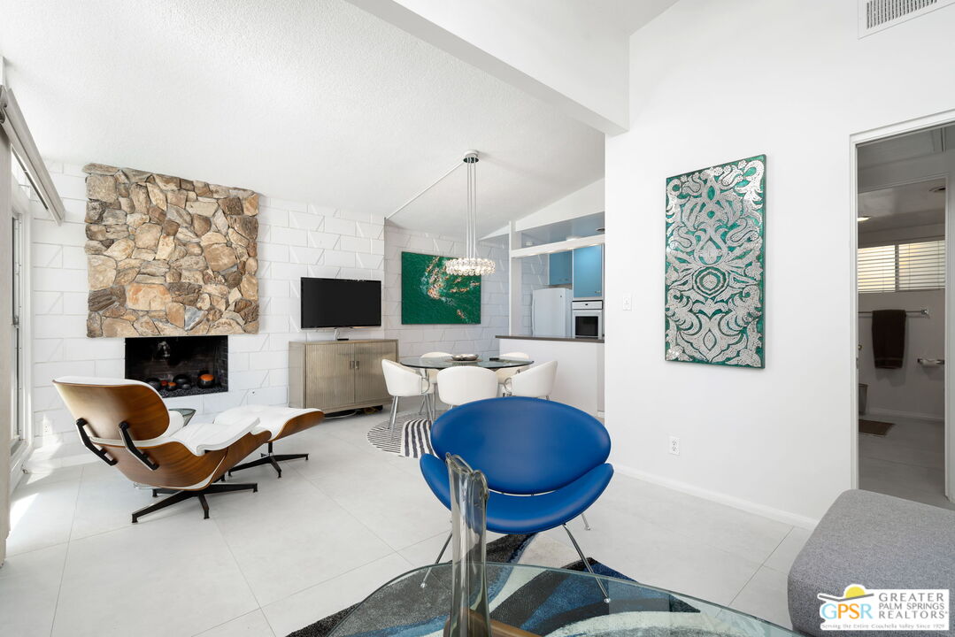 1655 Andee Drive Palm Springs, CA 92264 - Photo 11 of 26 a living room with furniture and a flat screen tv