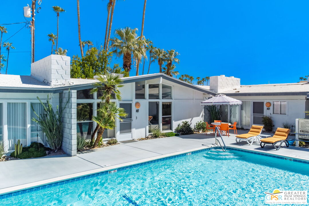 1655 Andee Drive Palm Springs, CA 92264 - Photo 25 of 26 a backyard of a house with seating space