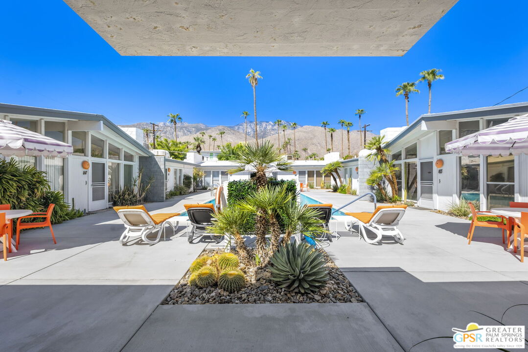 1655 Andee Drive Palm Springs, CA 92264 - Photo 3 of 26 a view of a patio with a table and chairs and potted plants