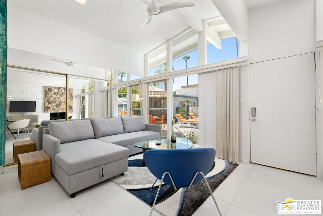 1655 Andee Drive Palm Springs, CA 92264 - Photo 10 of 26 a living room with furniture and a window