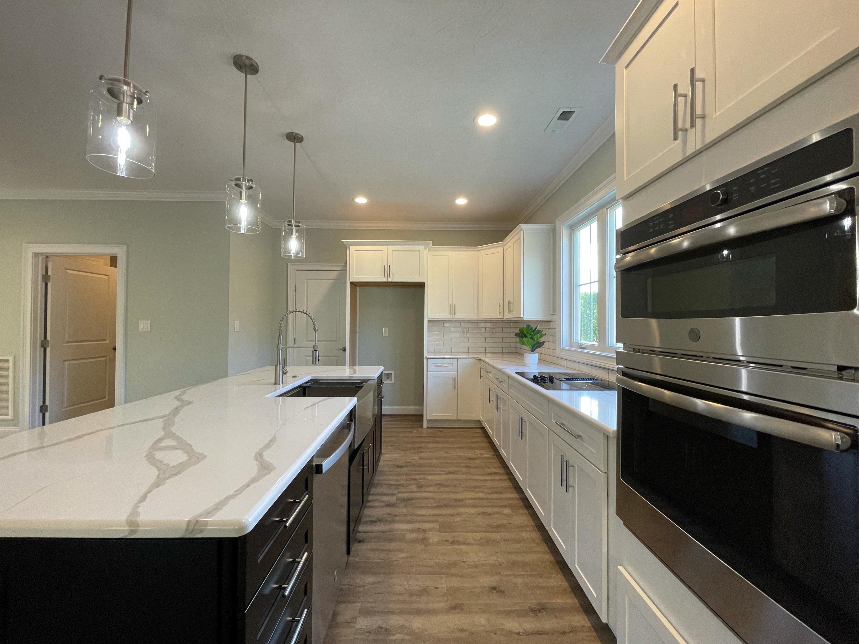 1675 Mountain View Road Vinton, VA 24179 - Photo 11 of 31 a large kitchen with kitchen island a sink appliances